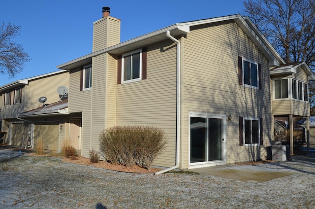 view of property exterior with a patio