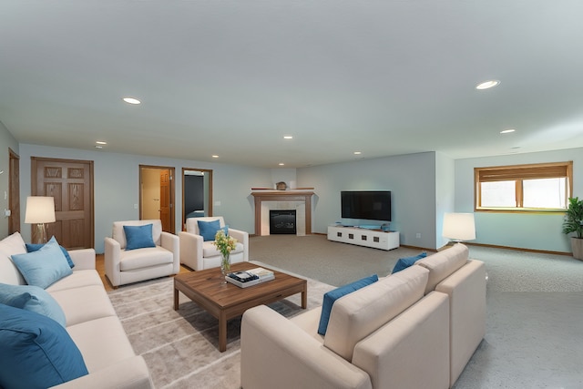 carpeted living room featuring a tile fireplace