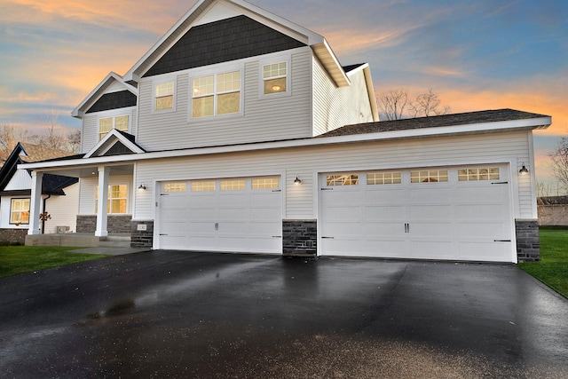 craftsman house featuring a garage