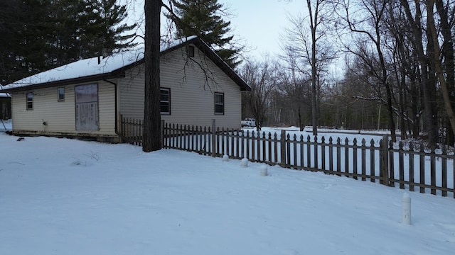 view of snow covered property