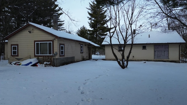 view of snow covered property