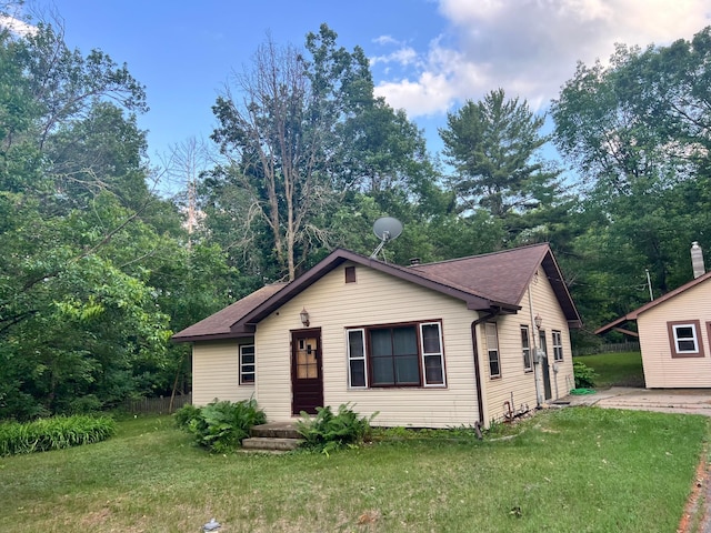 11159 Steamboat Loop NW, Walker, MN 56484 - bungalow with a front yard and roof with shingles