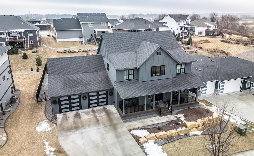 exterior space with a garage and covered porch