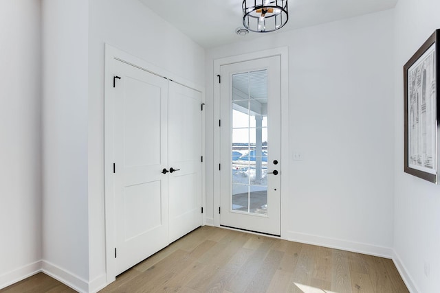 entryway with light wood-type flooring