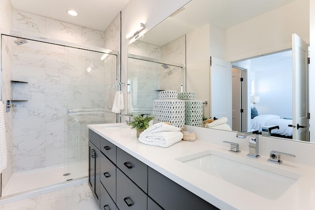 bathroom with vanity and an enclosed shower