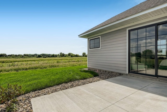 view of patio / terrace with a rural view