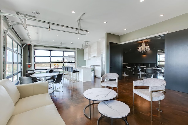 living room with plenty of natural light and sink