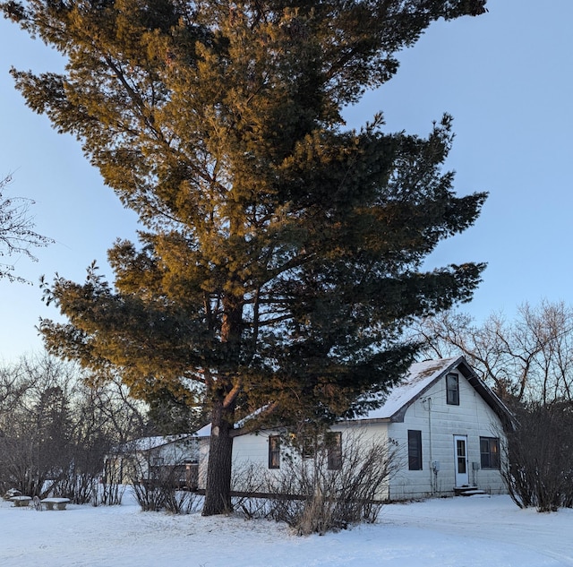 view of snow covered property