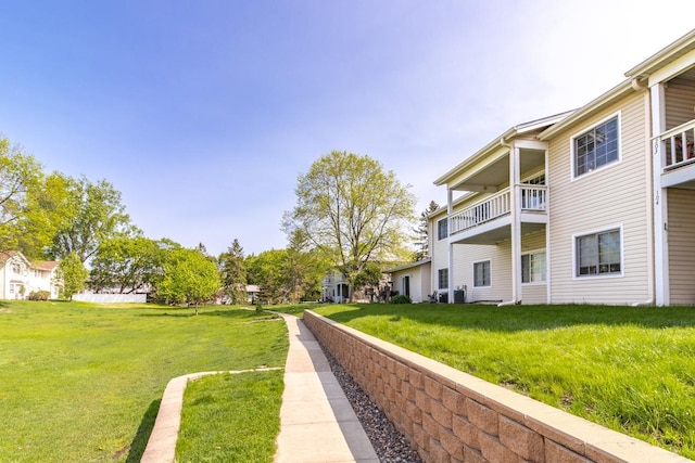 surrounding community featuring a yard