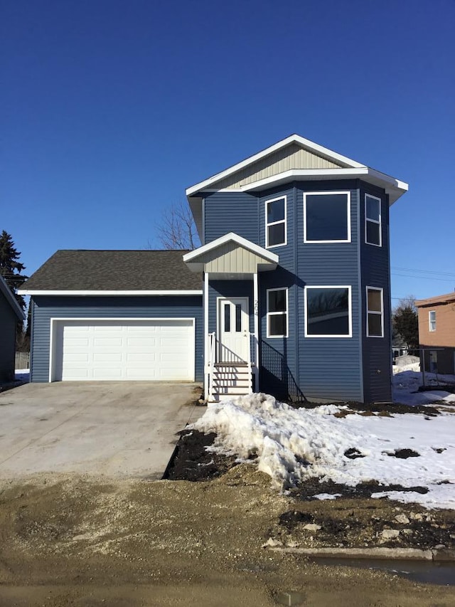 front of property featuring a garage