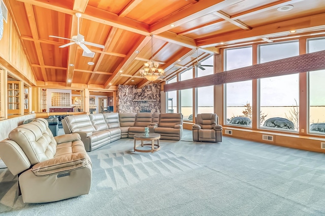 sunroom / solarium with wood ceiling, ceiling fan with notable chandelier, and vaulted ceiling with beams