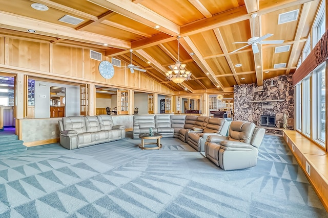 carpeted living room with vaulted ceiling with beams, wood ceiling, wood walls, and an inviting chandelier