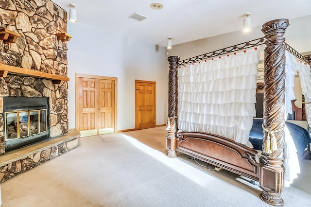 interior space with carpet and a fireplace