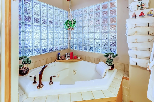 bathroom with tiled tub