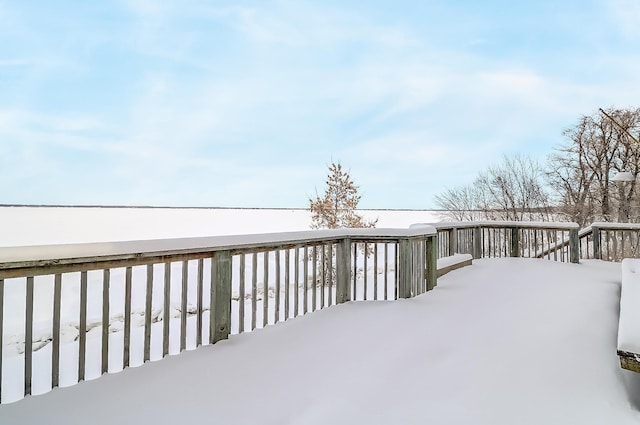 view of snow covered deck