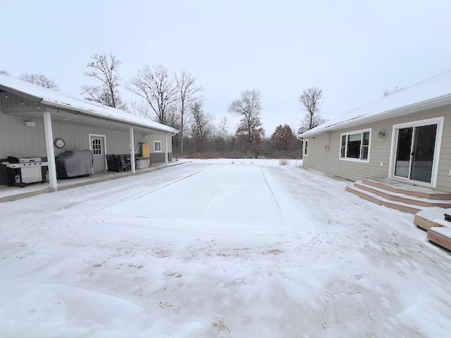 view of snowy yard