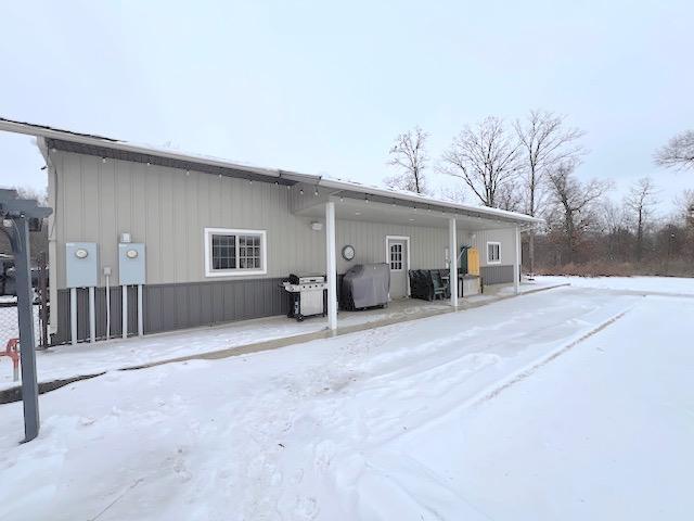 view of snow covered property