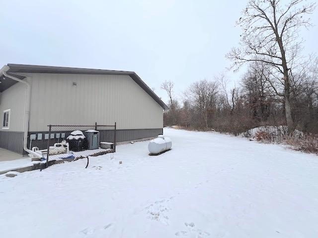 view of snow covered property