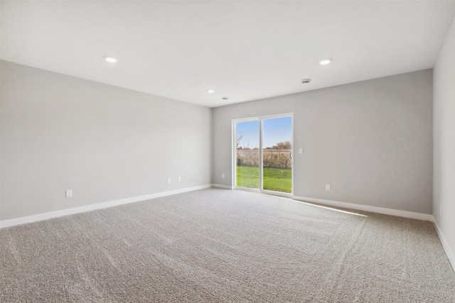 spare room featuring carpet floors