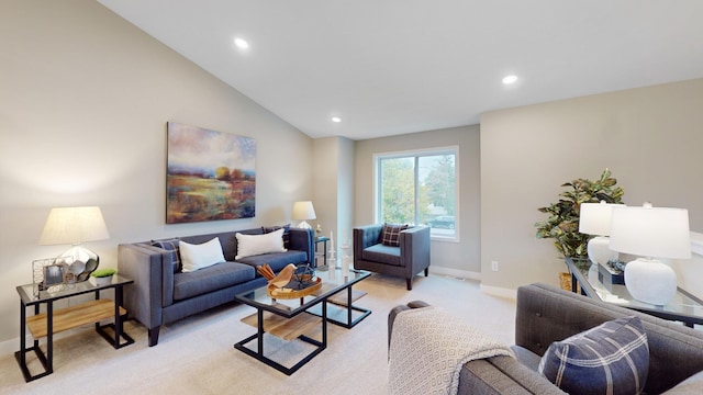 living room featuring light colored carpet and lofted ceiling