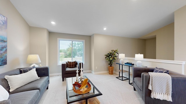 living room featuring light colored carpet