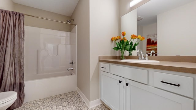 full bathroom featuring tile patterned flooring, vanity, shower / bath combo, and toilet