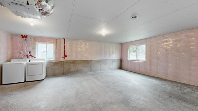 basement featuring separate washer and dryer and a wealth of natural light