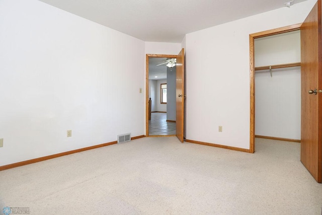 unfurnished bedroom with a closet