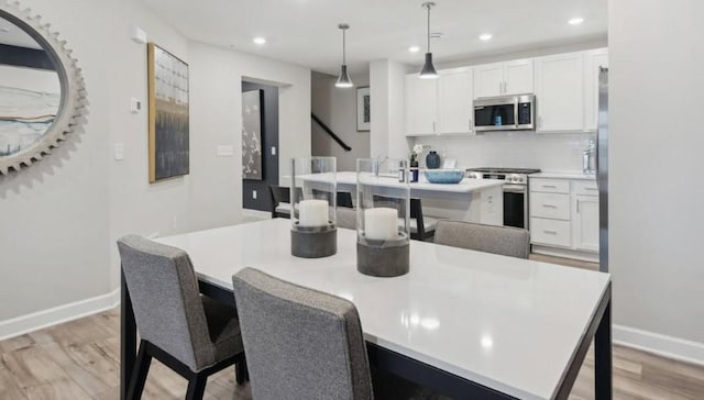 dining area featuring light hardwood / wood-style flooring