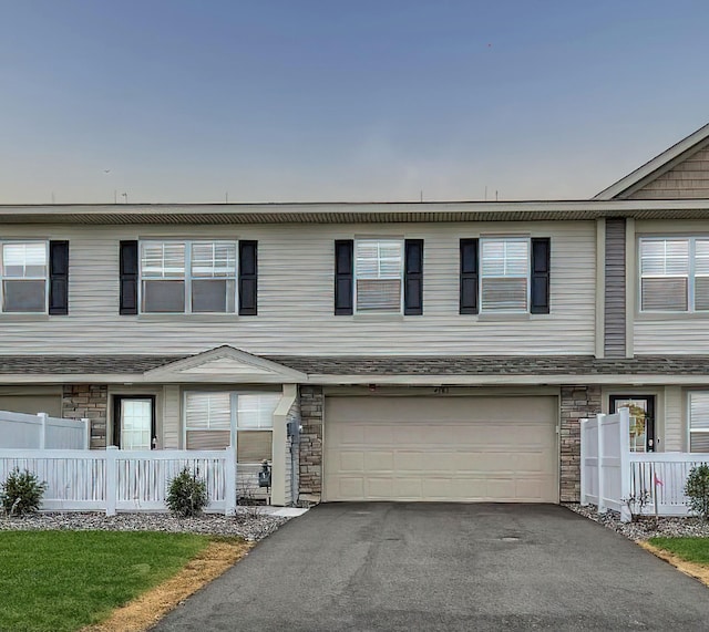 view of property with a garage