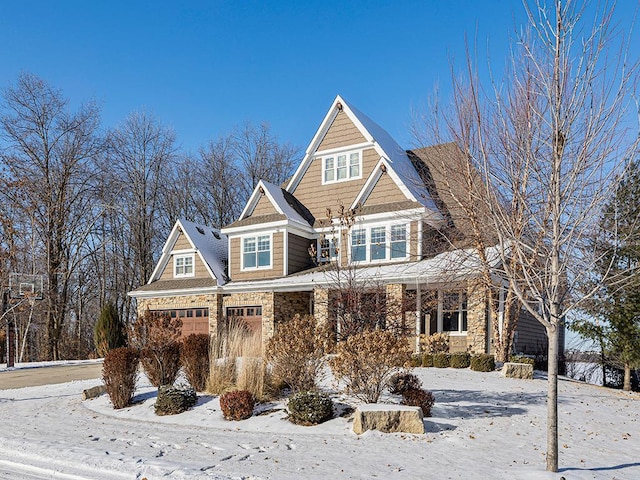 view of front of property with a garage