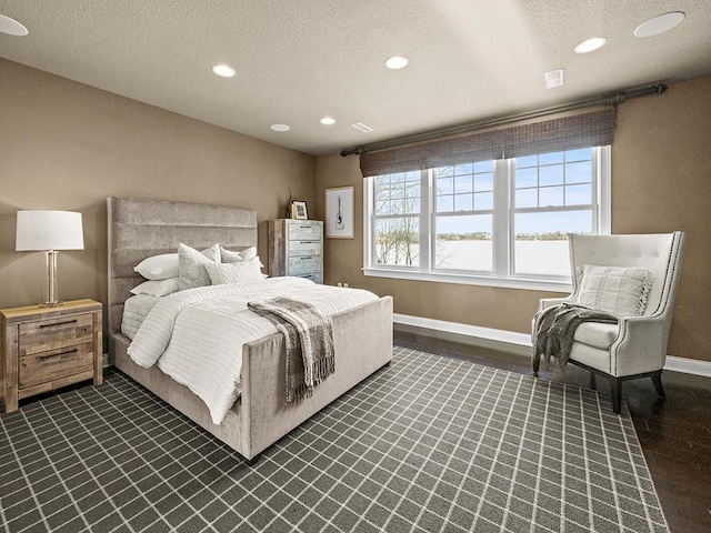 bedroom featuring a textured ceiling