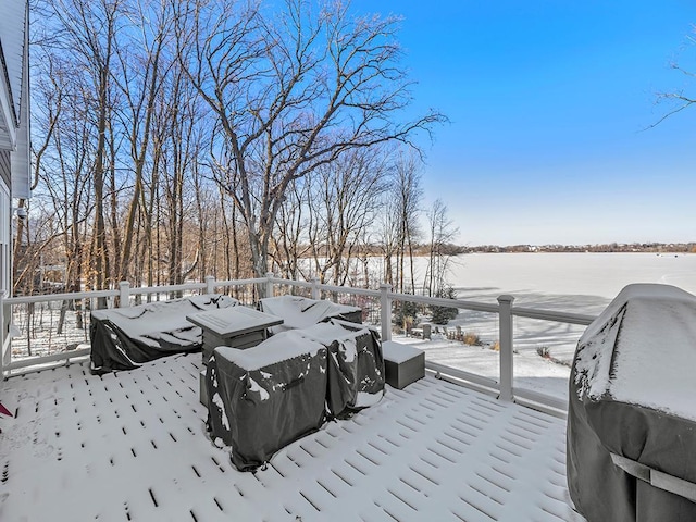 view of snow covered deck