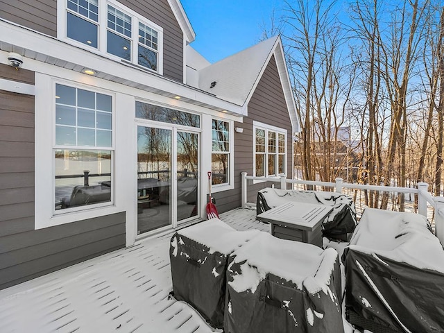 view of snow covered deck