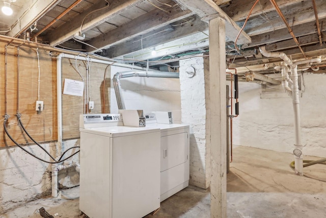 basement with separate washer and dryer