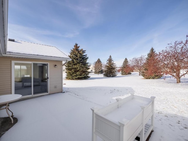 view of yard covered in snow