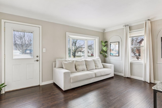 unfurnished living room with dark hardwood / wood-style flooring