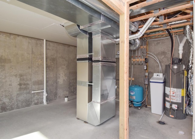 utility room featuring heating unit and water heater