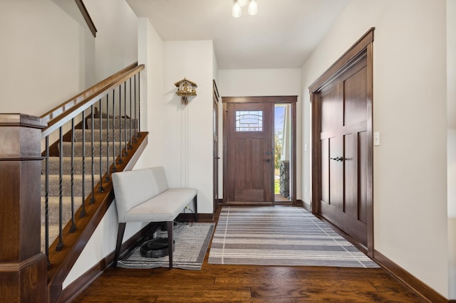 entrance foyer featuring dark hardwood / wood-style flooring