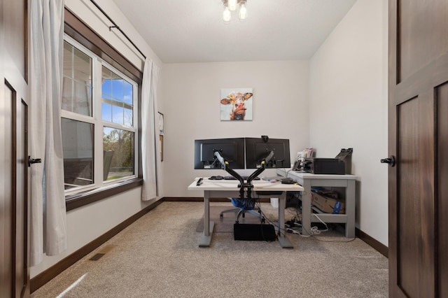 view of carpeted home office