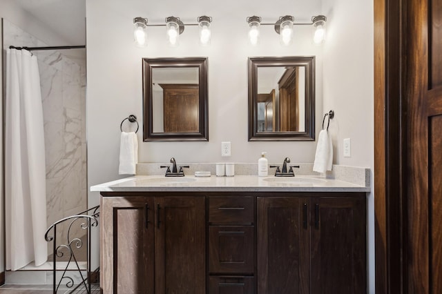 bathroom featuring vanity and a shower with curtain