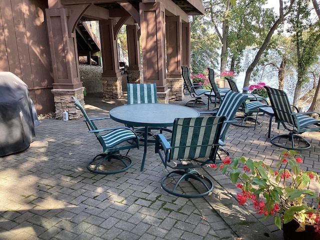 1516 Bay Oaks Dr, Albert Lea, MN 56007 - view of patio / terrace featuring outdoor dining space and area for grilling