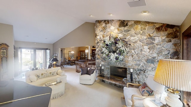 1516 Bay Oaks Dr, Albert Lea, MN 56007 - carpeted living room with a stone fireplace and high vaulted ceiling
