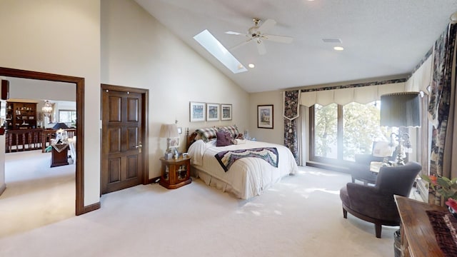 1516 Bay Oaks Dr, Albert Lea, MN 56007 - bedroom with light colored carpet, multiple windows, high vaulted ceiling, a skylight, and ceiling fan