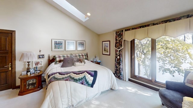 1516 Bay Oaks Dr, Albert Lea, MN 56007 - bedroom featuring a skylight, carpet, multiple windows, and high vaulted ceiling