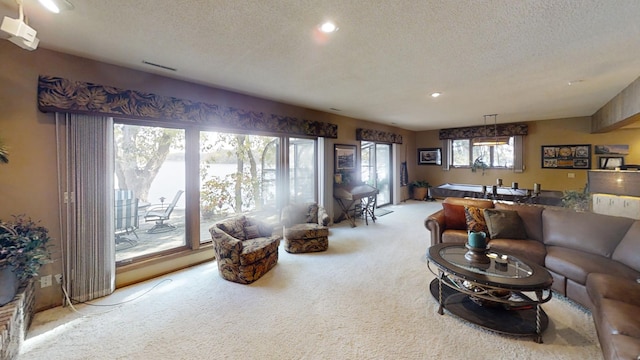 1516 Bay Oaks Dr, Albert Lea, MN 56007 - carpeted living area featuring a textured ceiling and recessed lighting