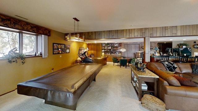 recreation room with light colored carpet and pool table