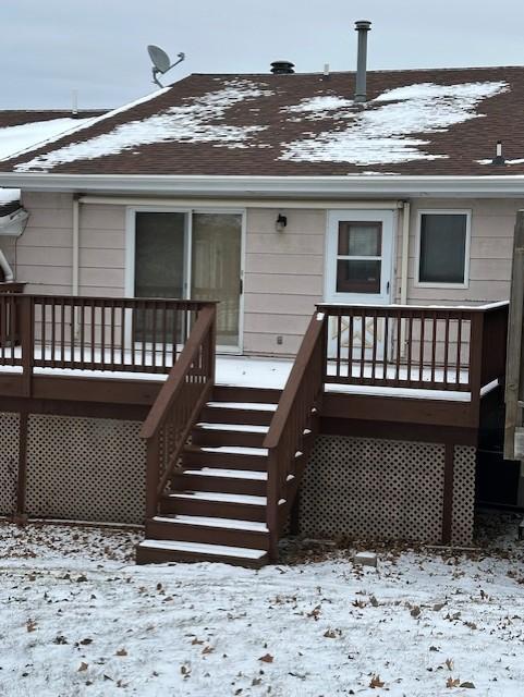 view of snow covered property