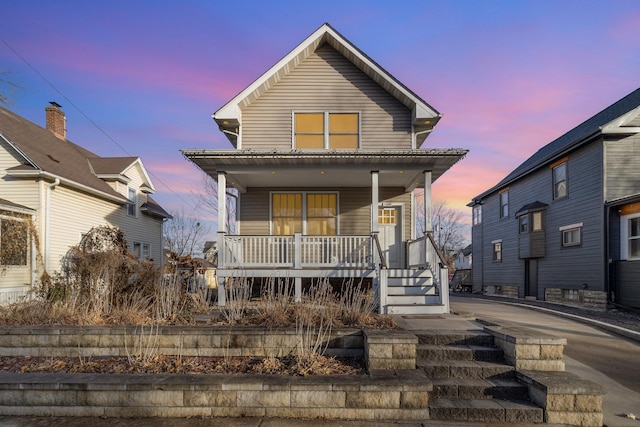 view of front of property featuring covered porch