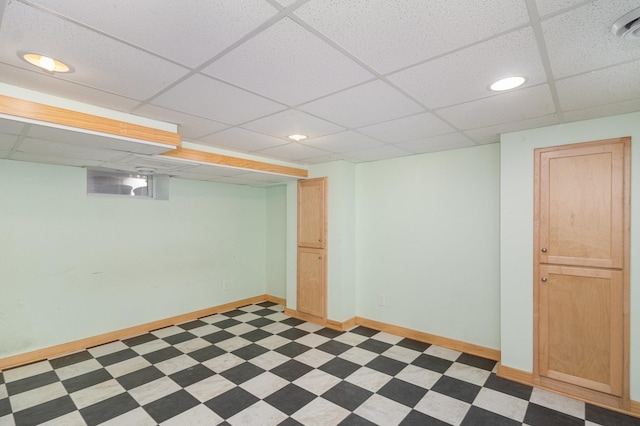 basement with a drop ceiling